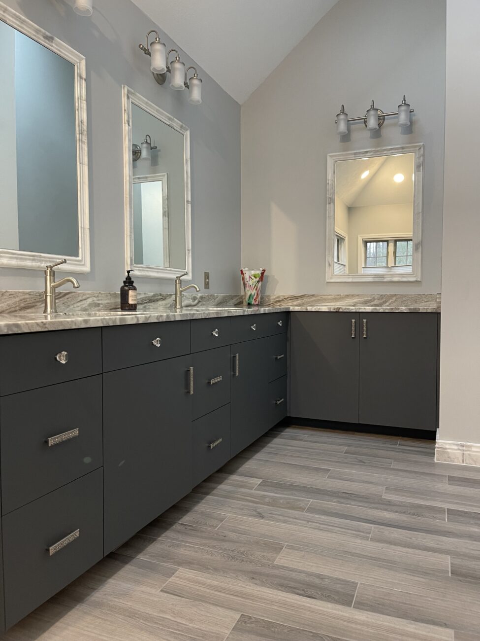 Carbon Grey frameless vanity cabinets in a modern minimal bathroom