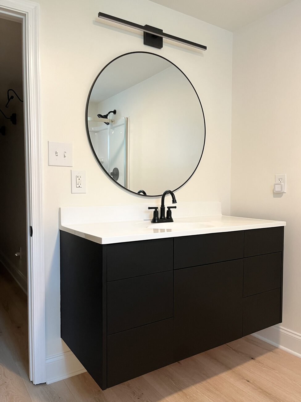 Minimalist floating vanity in black
