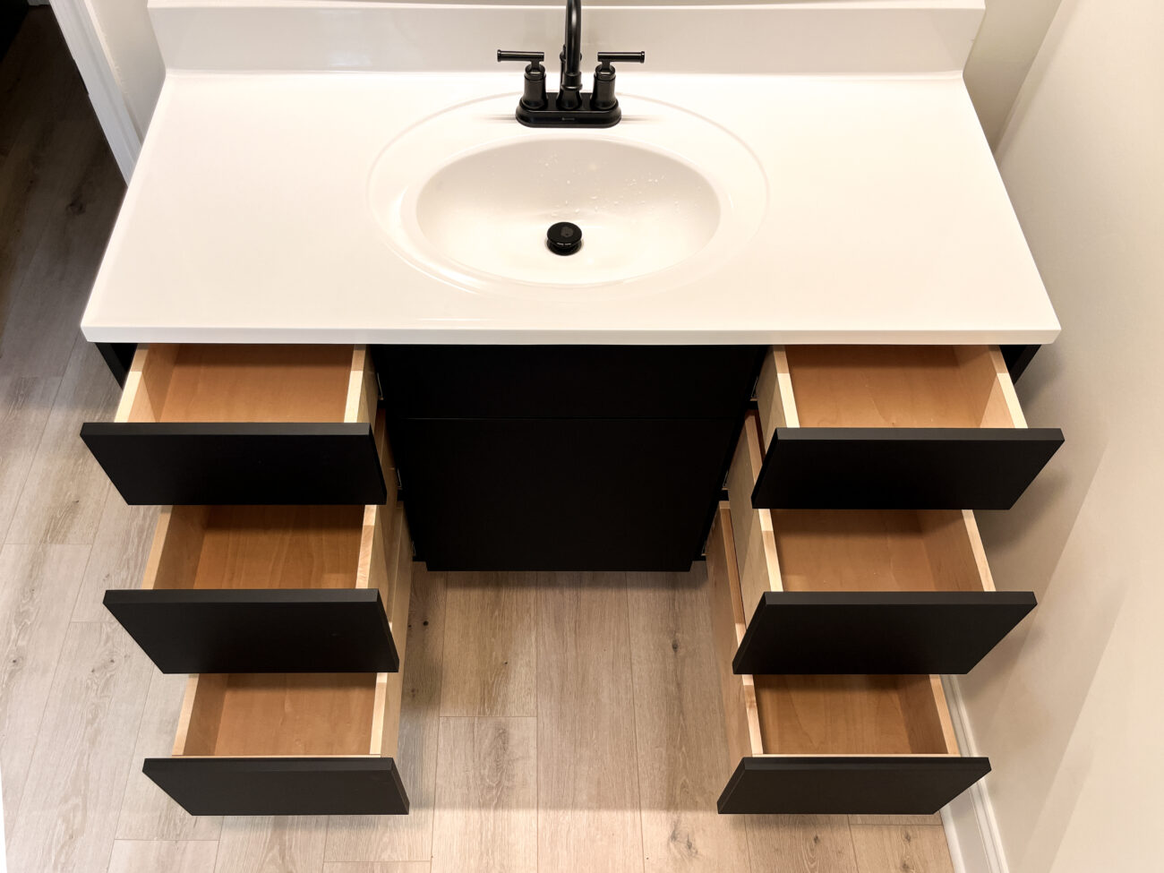 Minimalist floating vanity with six drawers